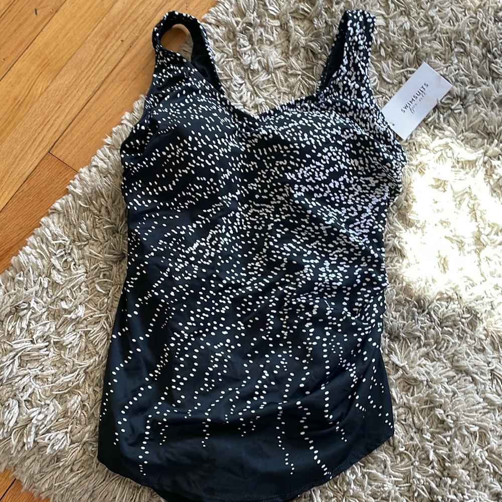 One piece NWT peplum front Swimsuits for All brand. built in cups.  size 14